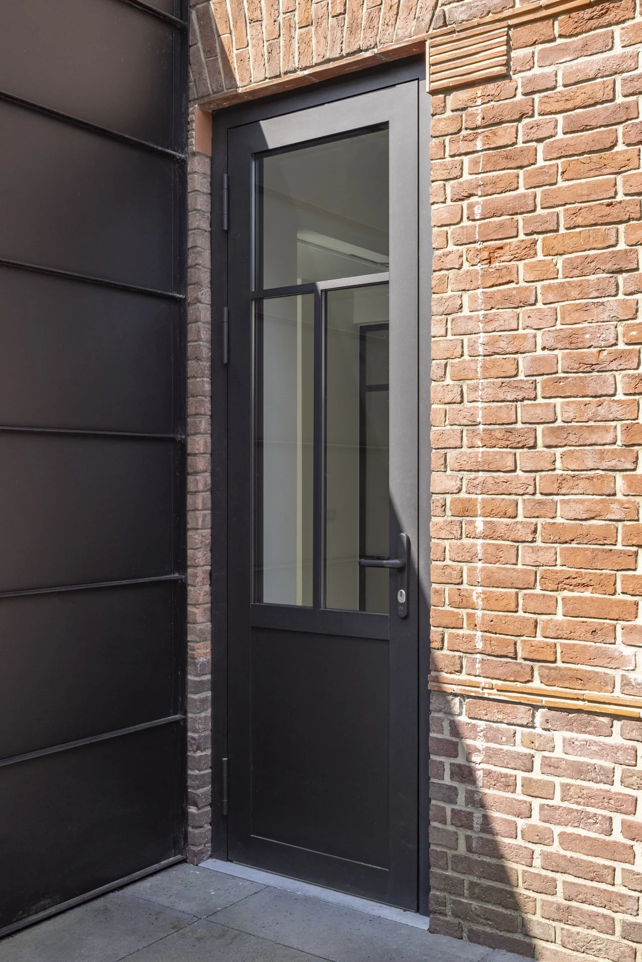 Aluminium achterdeur met paneel en glas