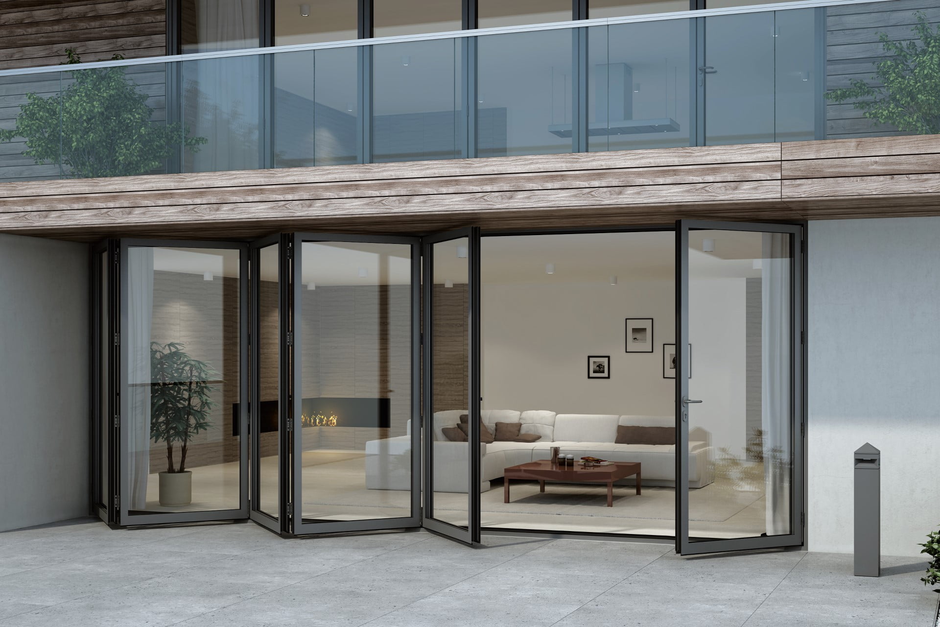 Buitenzicht op zwarte Aluprof MB-86 vouwwand met grote glaspartijen, deels geopend naar terras – Toelevering Online